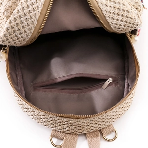 Straw woven backpack with pearl zipper detail and adjustable straps in beige