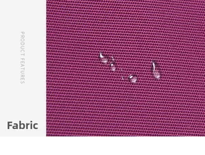 Detail shot of purple waterproof nylon fabric with clear water droplets on the surface