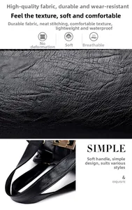 Detail of waterproof pebbled leather texture and high-quality stitching on black tote bag