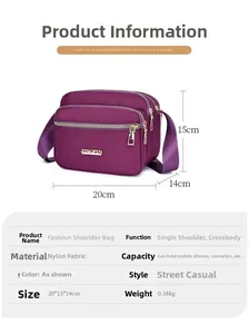 Detail view of purple nylon crossbody bag showing 20x15x14cm size dimensions and logo