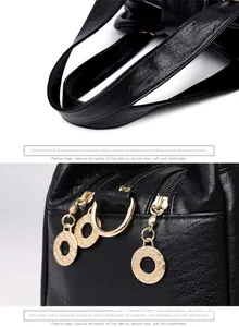 Detail view of the black lychee pattern leather strap with durable golden metal hardware