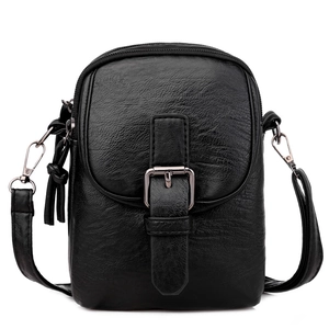 Classic black crossbody phone bag in textured faux leather with tassel and metal buckle