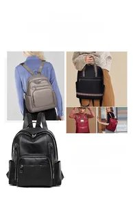 Close-up of stylish soft leather backpacks featuring multiple zipper pockets and side storage