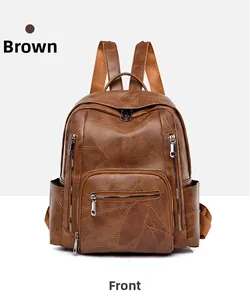 Close-up of brown PU leather backpack with geometric texture and three front zipper pockets
