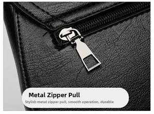 Detailed close-up of high-quality lychee pattern leather with a silver metal zipper puller