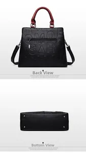 Details einer schwarzen Handtasche aus Leder mit Reißverschluss und Metallfüßen