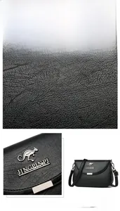 Detail of black lychee-textured leather crossbody bag featuring metal kangaroo logo
