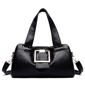 Classic black soft leather tote bag with a striking gold square buckle and detachable strap