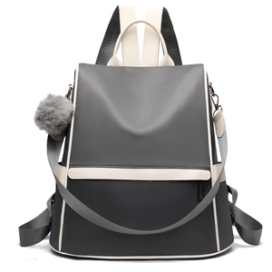 Minimalist Oxford fabric large capacity backpack in grey colorblock with fuzzy ball charm