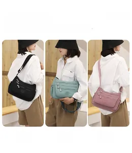 Multiple carrying styles for the multi-pocket nylon crossbody bag in various colors