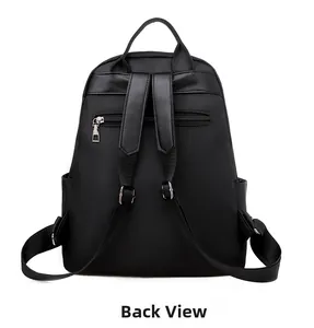 Vue arrière du sac à dos noir étanche avec bretelles réglables et poche de sécurité cachée