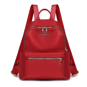 Sac à dos rouge en tissu Oxford avec plusieurs compartiments zippés et grande capacité