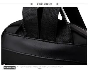 Gros plan des coutures renforcées et du cuir grainé litchi sur le sac à dos noir
