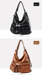 Detail view of large retro multi-pocket tote bags in black and yellow-brown colors