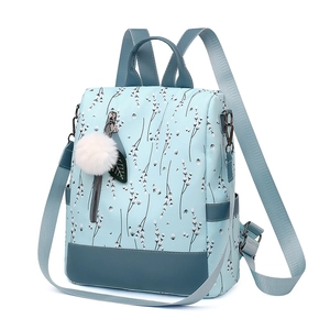 Sac à dos vert menthe à fleurs avec motifs ethniques et pompon décoratif doux