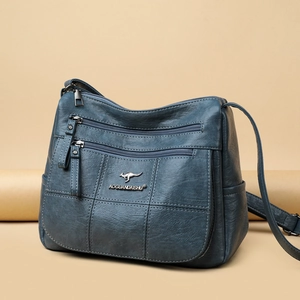 Classic dark blue textured leather crossbody bag with multi-zipper layers and shoulder strap