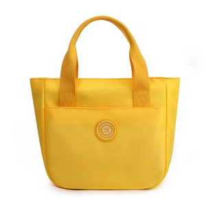 Grand sac cabas en nylon jaune vif avec logo circulaire pour un usage quotidien décontracté