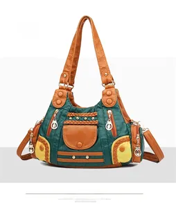 Detail view of woven leather texture and metal rivets on a multi-color PU handbag