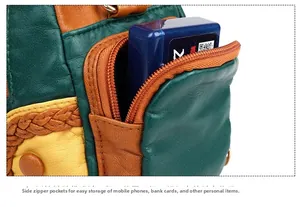 Detail of multi-color washed leather tote with functional zipper side pocket and texture