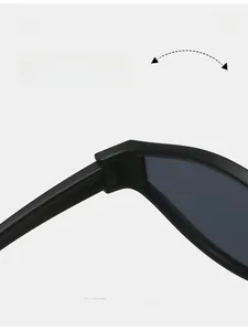 Macro detail of matte black cycling sunglasses showing durable hinge construction and texture