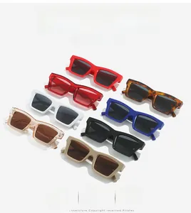 Macro shot of stylish rectangular sunglasses in multiple colors on a white background