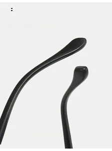 Detail of curved black sunglasses arms designed for ergonomic comfort and sleek style