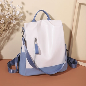 Chic color-block PU leather backpack in white and blue with anti-theft zipper pockets