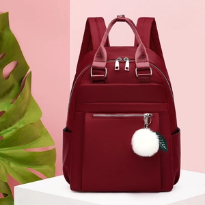Sac À Dos Femmes Tissu Oxford Imperméable Grande Capacité Voyage École Sac Avec Pompon Peluche Décontracté Mode