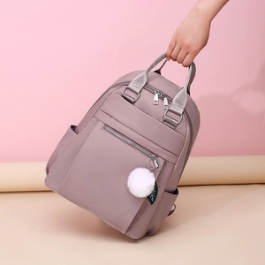 Sac à dos minimaliste en tissu Oxford violet clair avec grands compartiments et pompon