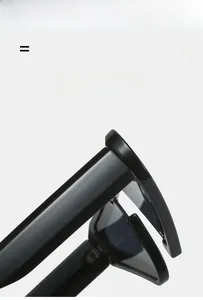 Detailaufnahme der schwarzen Y2K-Sonnenbrille aus leichtem und super elastischem Material