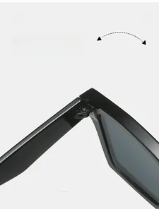 Detail shot of durable metal hinges on minimalist square black sunglasses for women