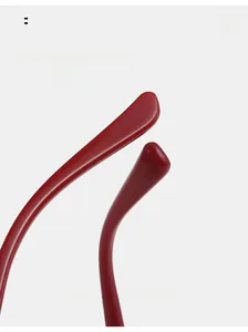 Detail of deep red TR90 curved temple tips for comfortable ergonomic eyewear fit