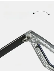 Detail of durable reinforced hinges on cat-eye glasses with sparkly transparent frame