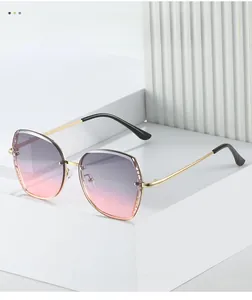 Detail of trendy gold metal sunglasses with purple gradient lenses on geometric display