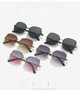Detailed close-up of fashion oversized sunglasses with hollowed metal temple designs