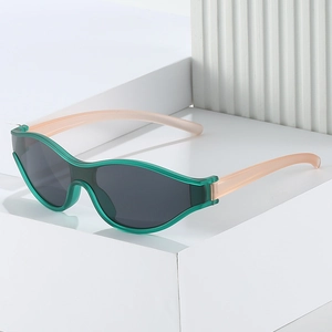 Minimalist cycling sunglasses with translucent green frame and light pink temples for sports