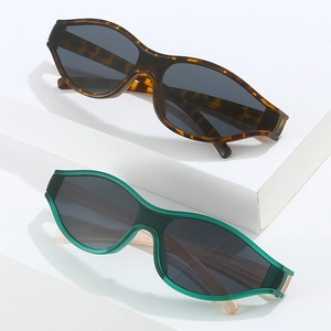 Minimalist cat-eye cycling sunglasses with leopard print and green translucent frames