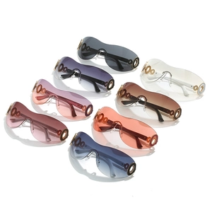 Y2K rimless shield sunglasses featuring oversized wrap lenses in seven gradient colors