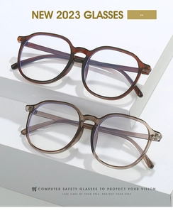 Close-up of TR90 anti-blue light glasses in dark brown and light grey frames