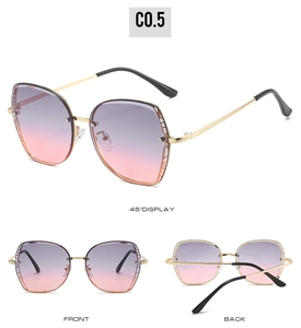Detail view of purple gradient polygon sunglasses with golden metal temples and black tips