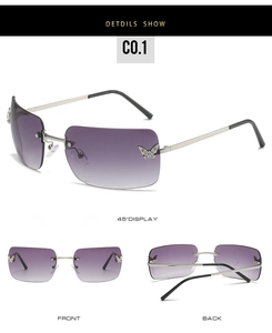 Close-up of Y2K rimless sunglasses with purple gradient lenses and silver butterfly rhinestone