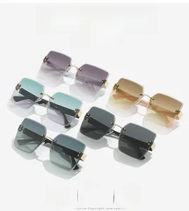 Overhead view showing five color variants of rimless square sunglasses with gold metal bridge