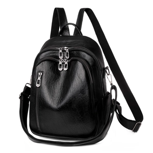 Fashionable black PU leather backpack with multi-pocket design and glossy texture finish