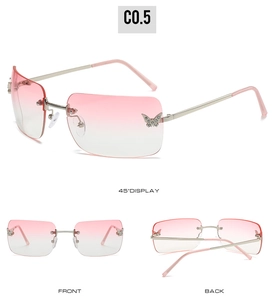 Detail view of pink gradient rimless sunglasses with silver butterfly diamond accents