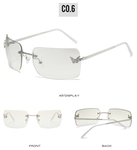 Three-way view of rimless Y2K sunglasses with butterfly rhinestone decor and silver temples
