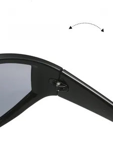 Detail of durable reinforced metal hinge on black cyberpunk Y2K cycling sunglasses