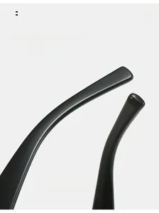 Detail of curved black mirror legs on futuristic cyberpunk Y2K cycling sunglasses