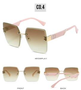 Detail view of rimless square sunglasses with pink temples and gold metal D logo