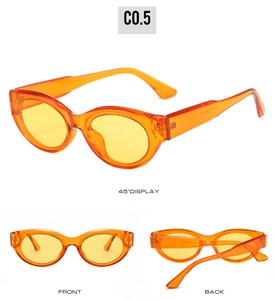 Vue détaillée des lunettes de soleil œil de chat orange avec verres jaunes