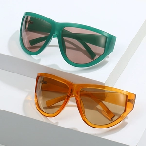 Futuristic cyberpunk Y2K oversized wrap sunglasses with transparent green and orange frames